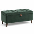Banc de rangement en velours vert avec pieds en bois